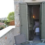 מלון דירות Petras Gi - Stone 4*
